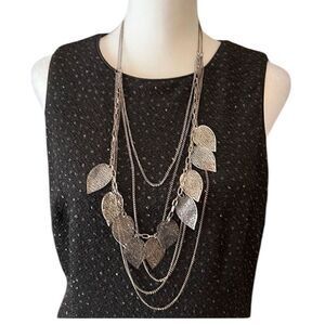 Beautiful silver colored multi strand necklace with chains and leaves EUC